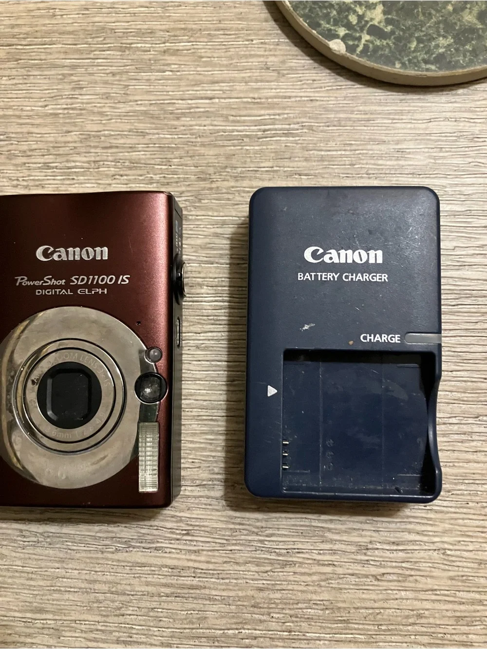 Canon PowerShot SD1100 IS Compact Red Camera with Navy Canon Battery Charger